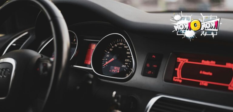 Car dashboard with warning lights illuminated