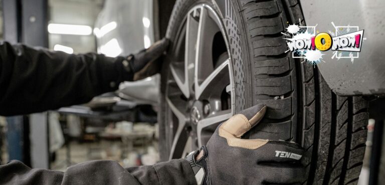 Close-up of a car tire tread and pressure gauge