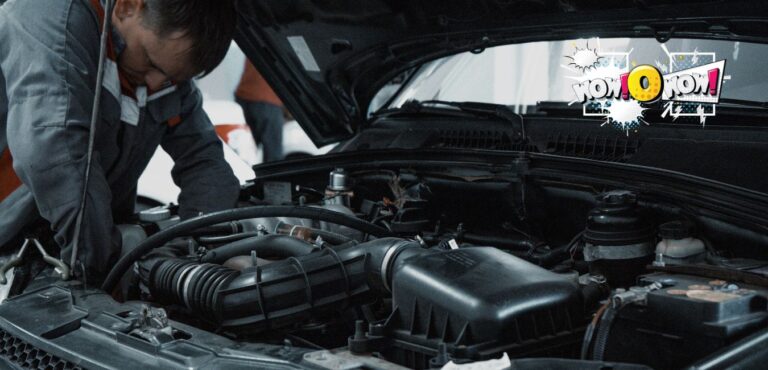 Mechanic listening to a car engine